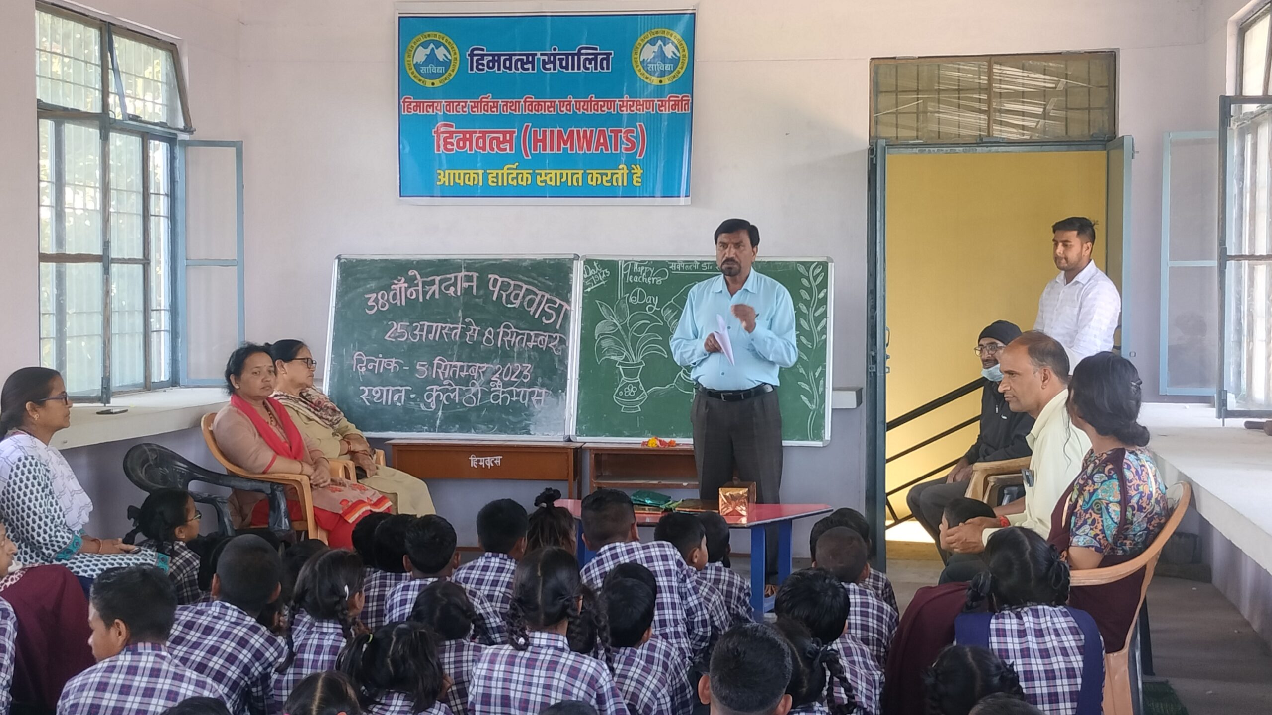 A talk to a classroom of children during Netra Daan Pakwada.