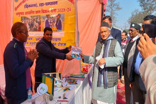 Members of the society at their stall at Uttarakhand Open University, Haldwani.
