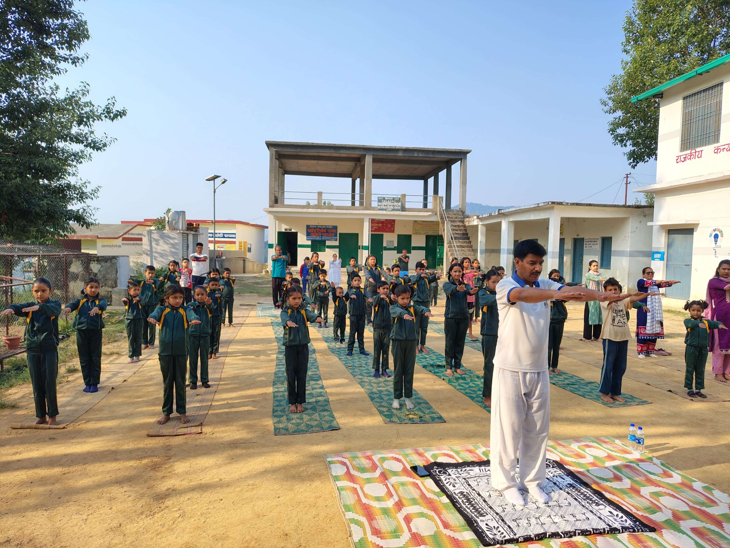 Participants taking part in an International Yoga Day session run by HIMWATS at the Kulethi campus.
